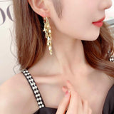 Sequined tassel earrings 716729737869 - COCOMELODY