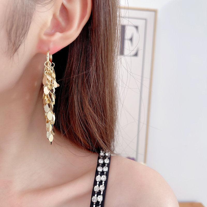 Sequined tassel earrings 716729737869 - COCOMELODY