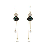 Scalloped pearl shell earrings 638241104102 - COCOMELODY