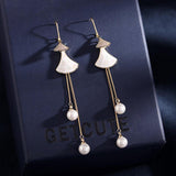 Scalloped pearl shell earrings 638241104102 - COCOMELODY