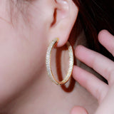 Zircon plated round earrings 641798255069 - COCOMELODY