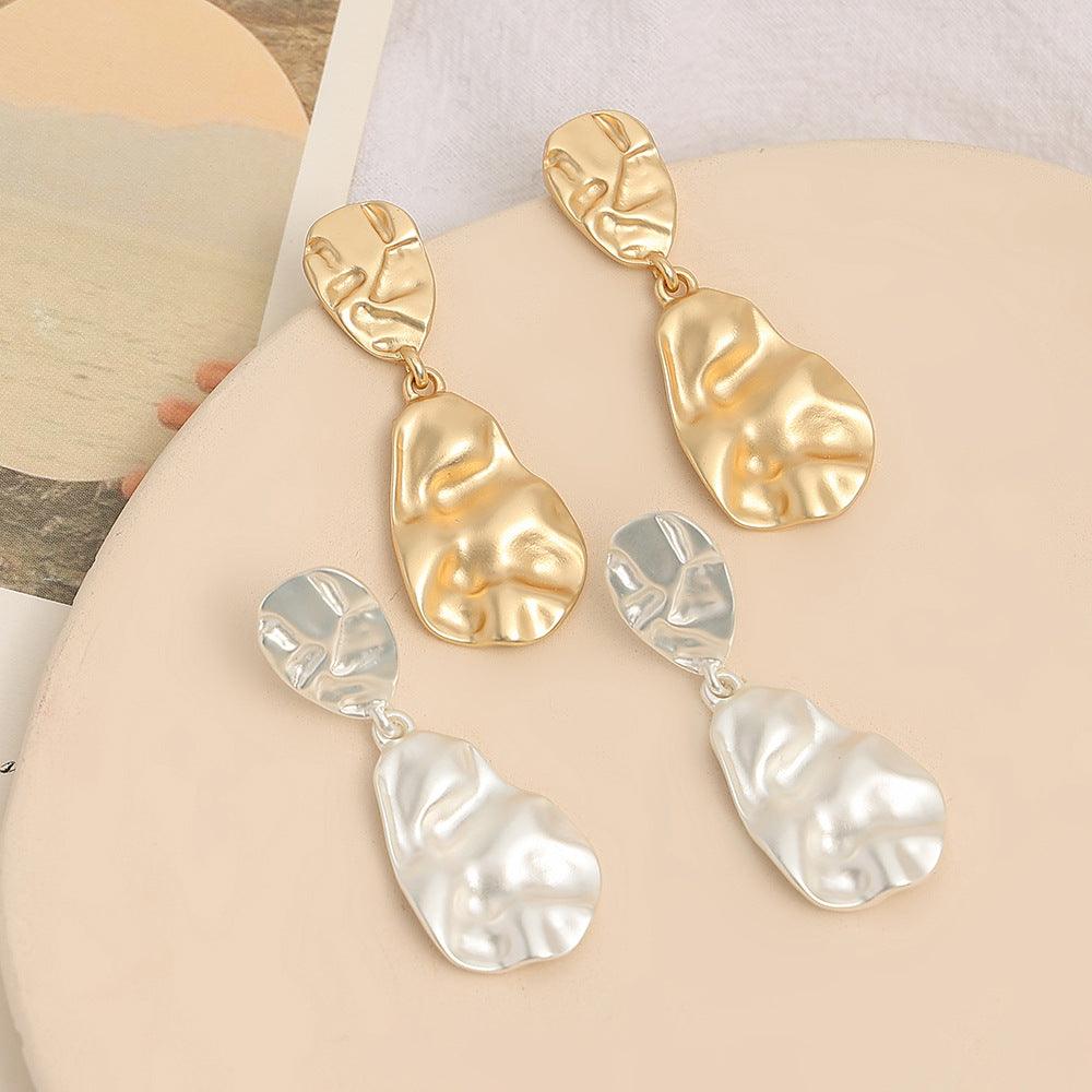 Drop-shaped percussion top fashion earrings 675009716085 - COCOMELODY